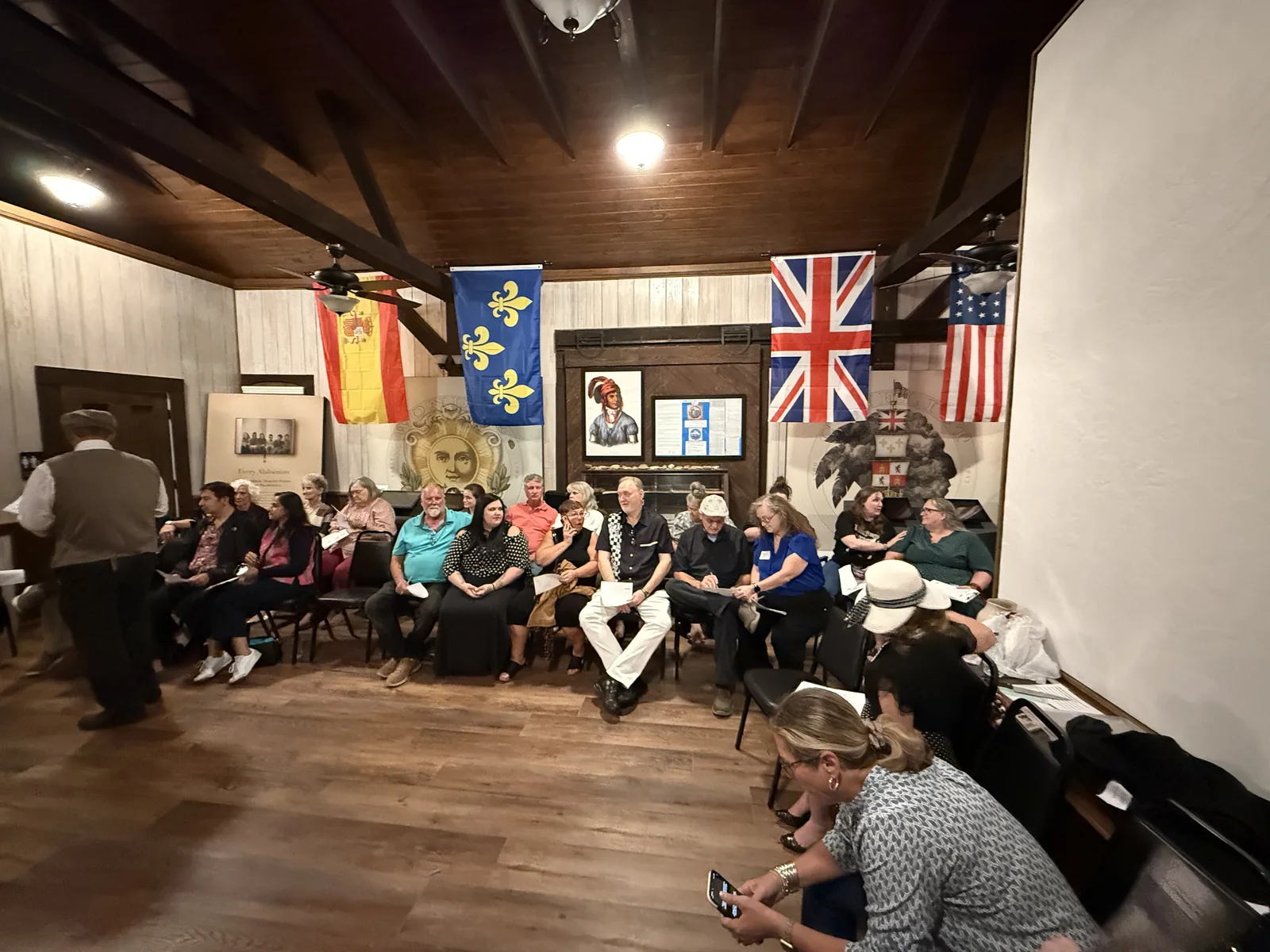 A sold-out crowd of 65 filled the depot.